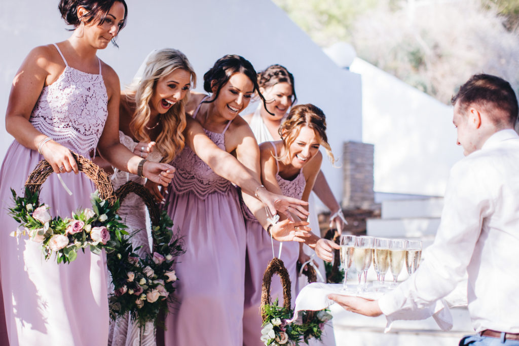 grabbing champagne with excitement