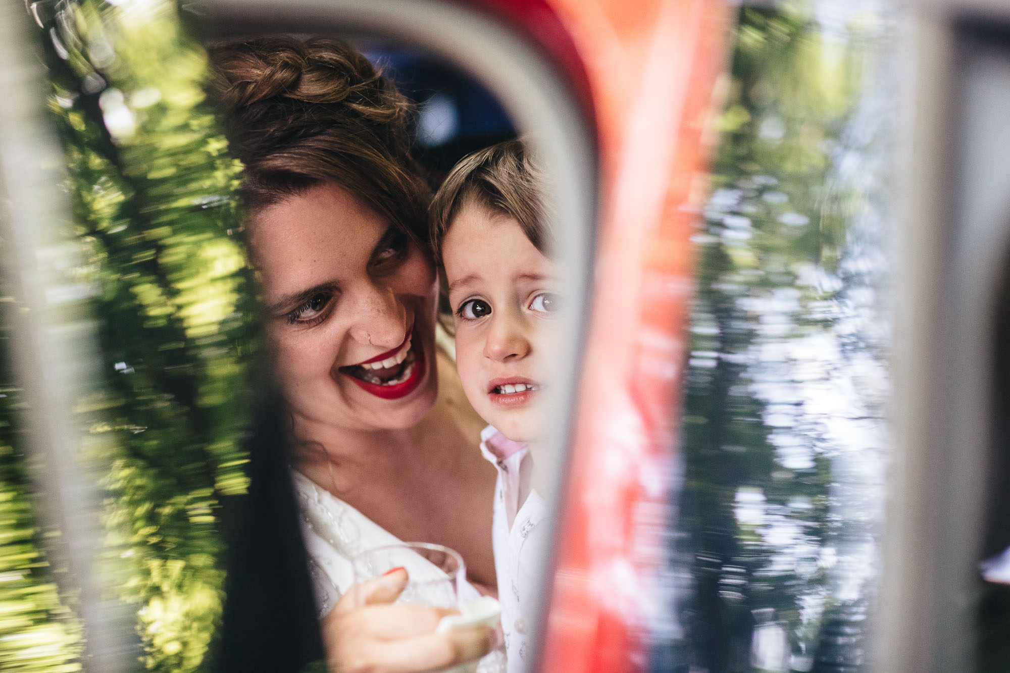 bride arrives in car with son
