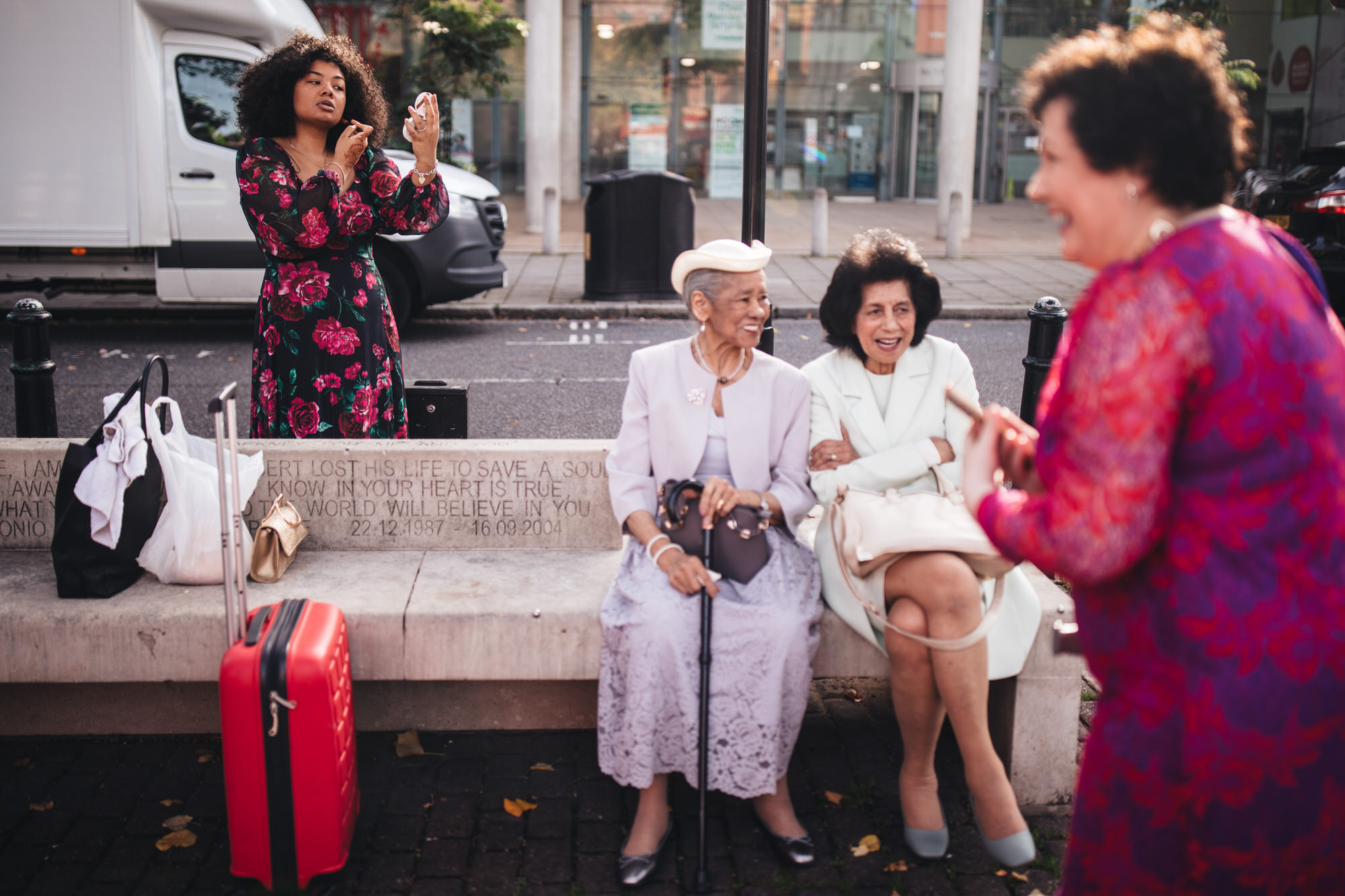 guest applies makeup in street