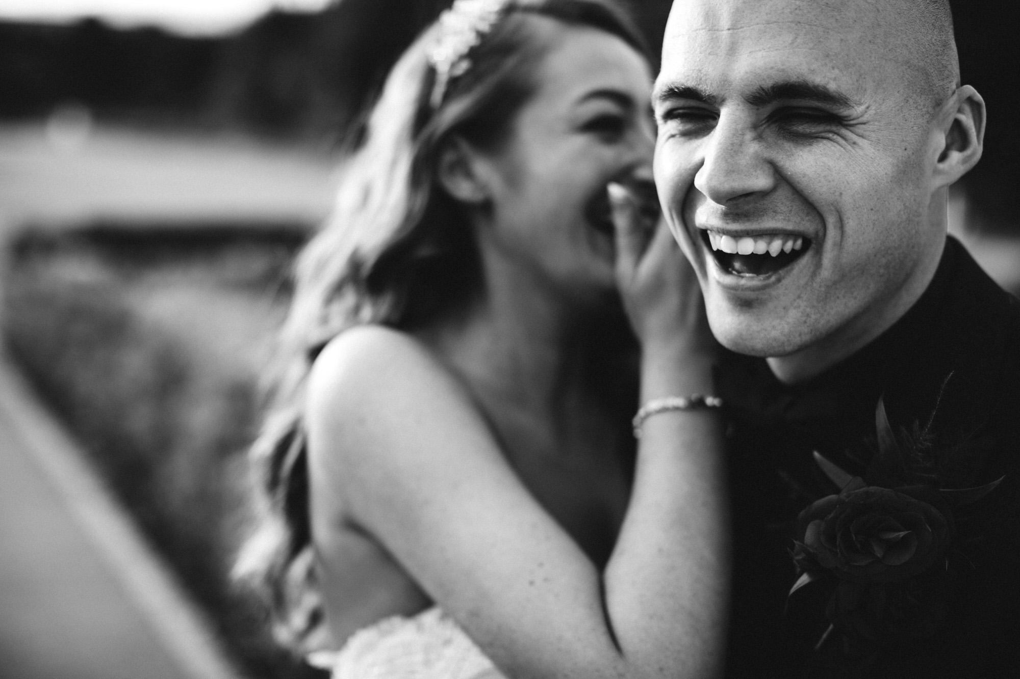 couple laugh in blurry happy photo