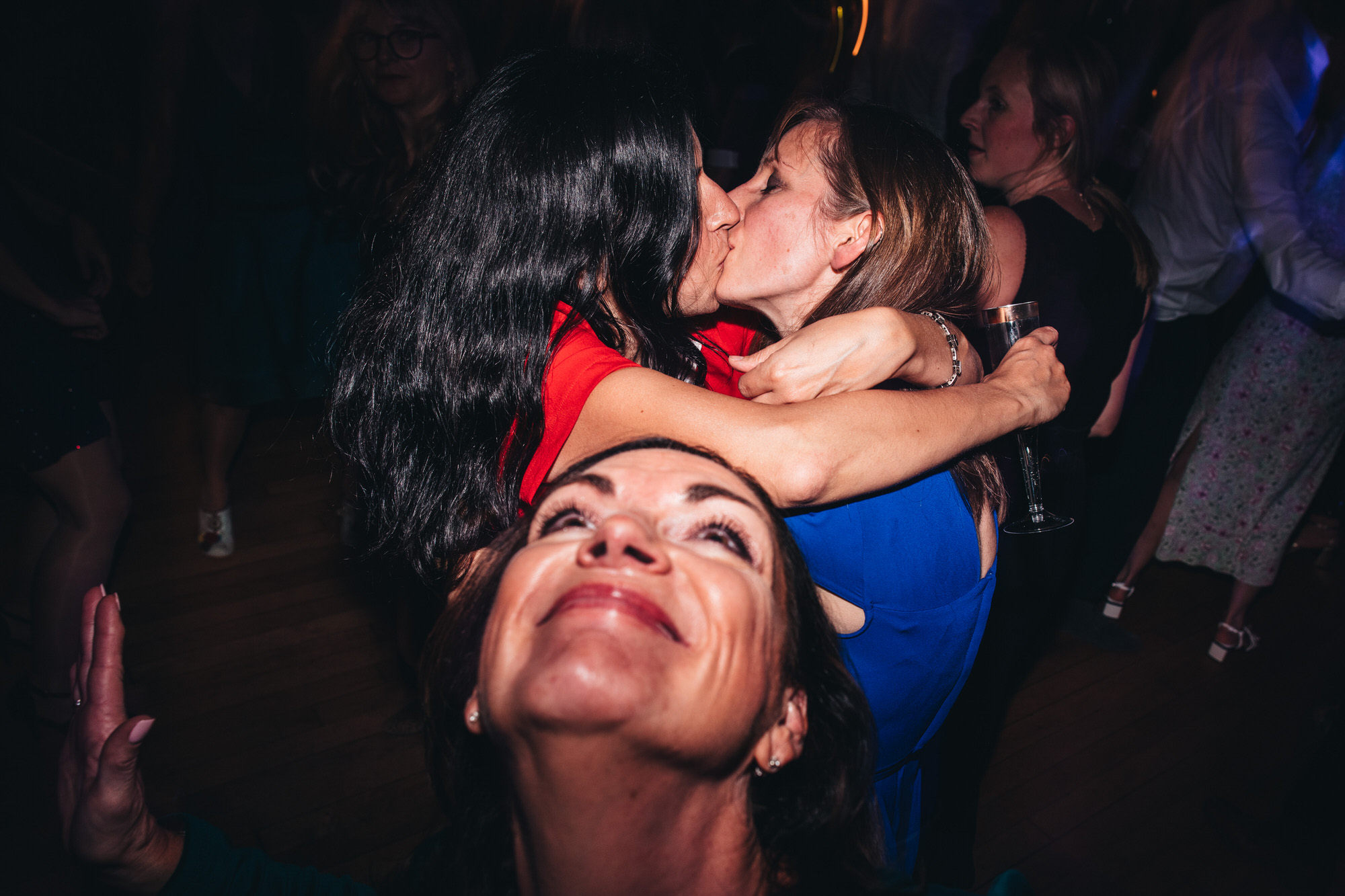 women looks up at couple