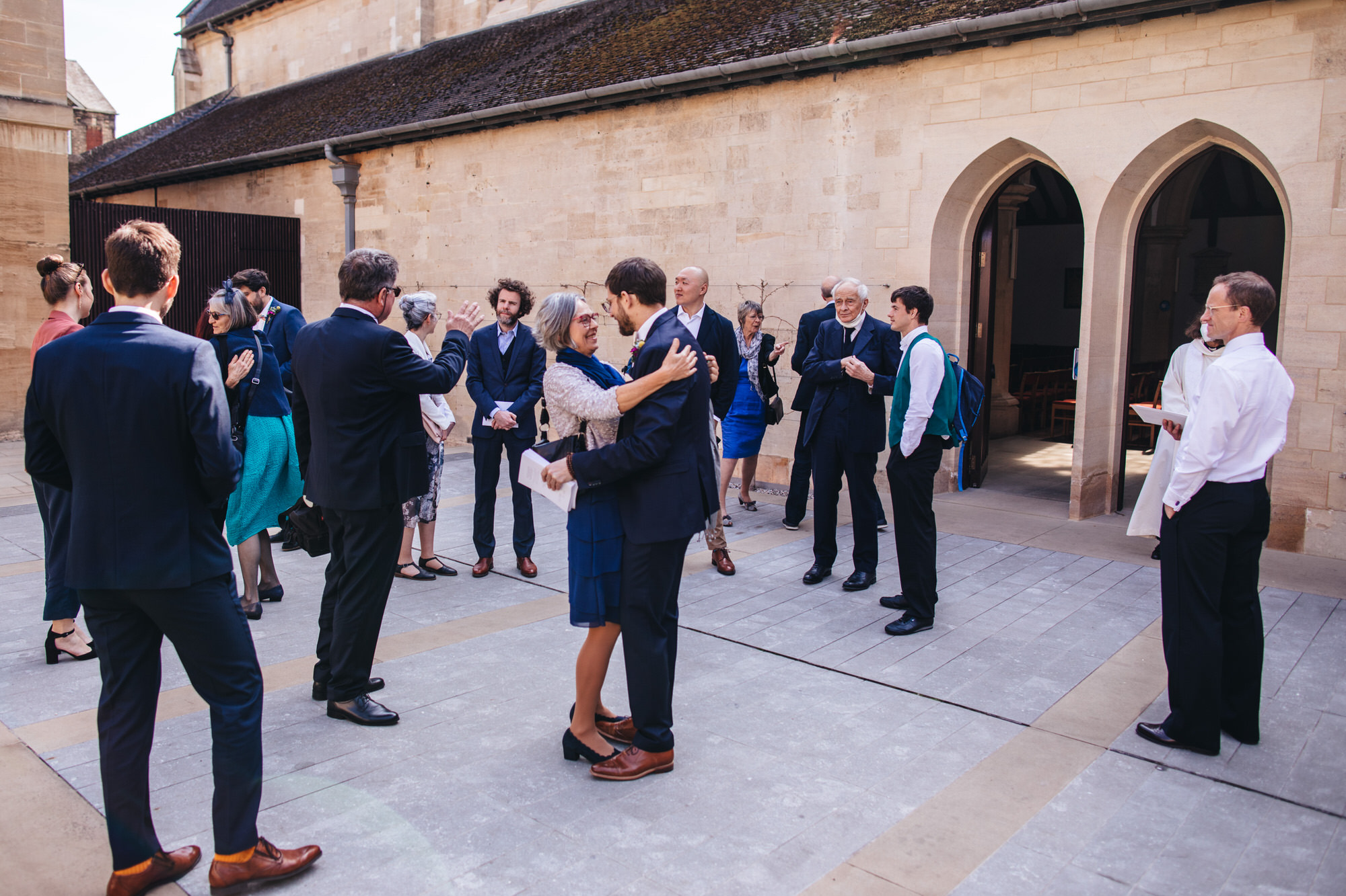 guests mingle outside church in oxford