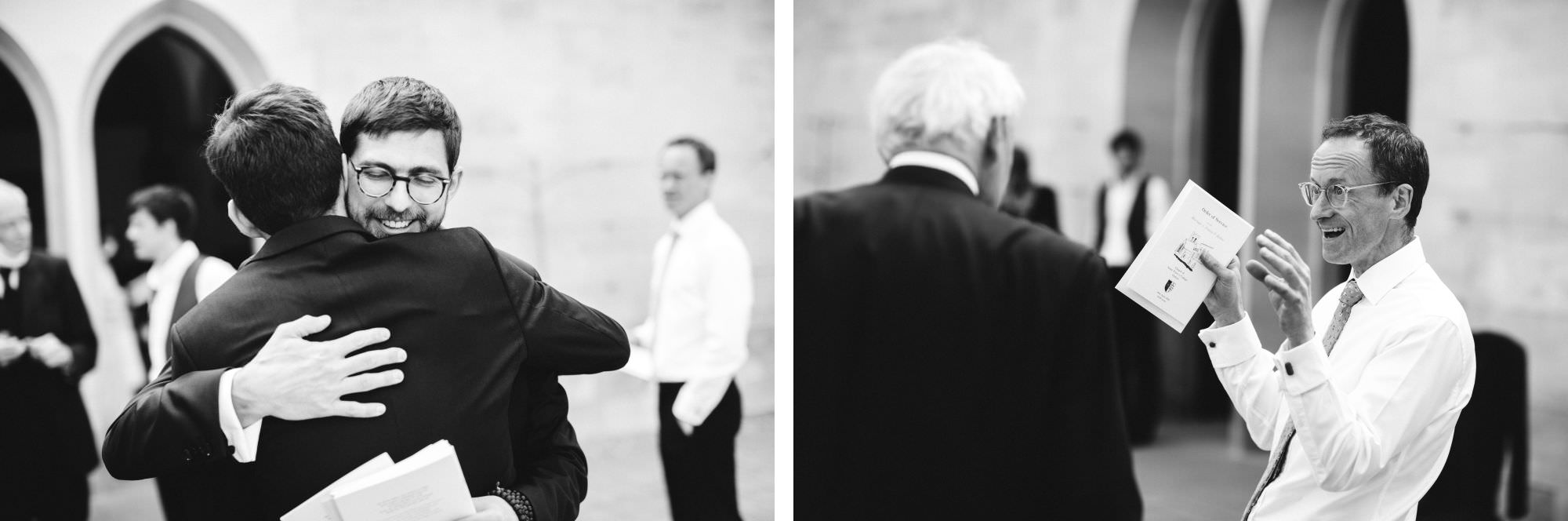 groom hugs and friend gestures wildly with hands