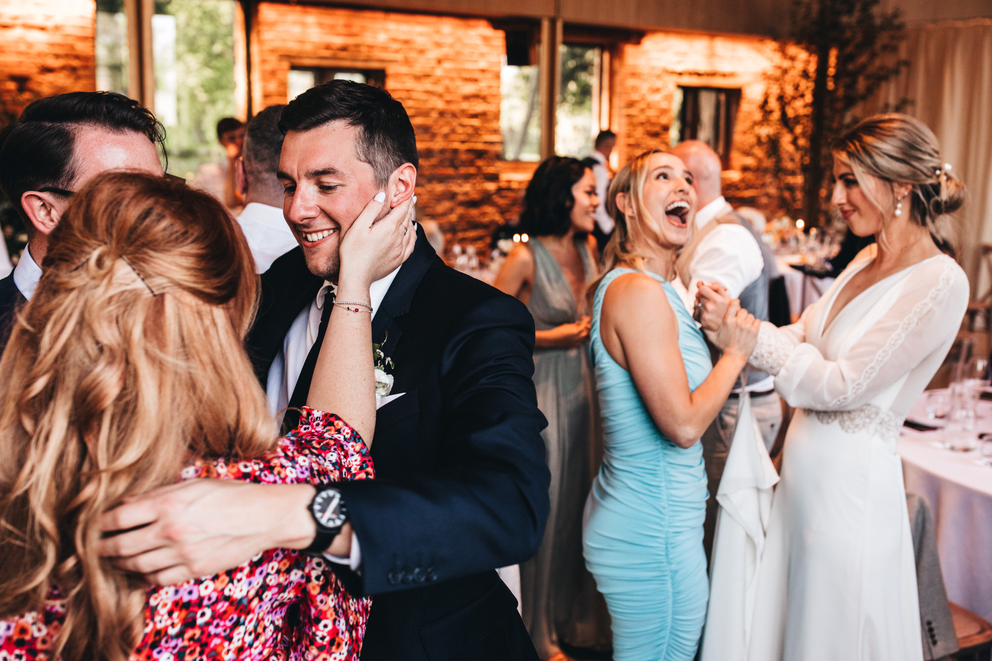 guest hugging after wedding speeches