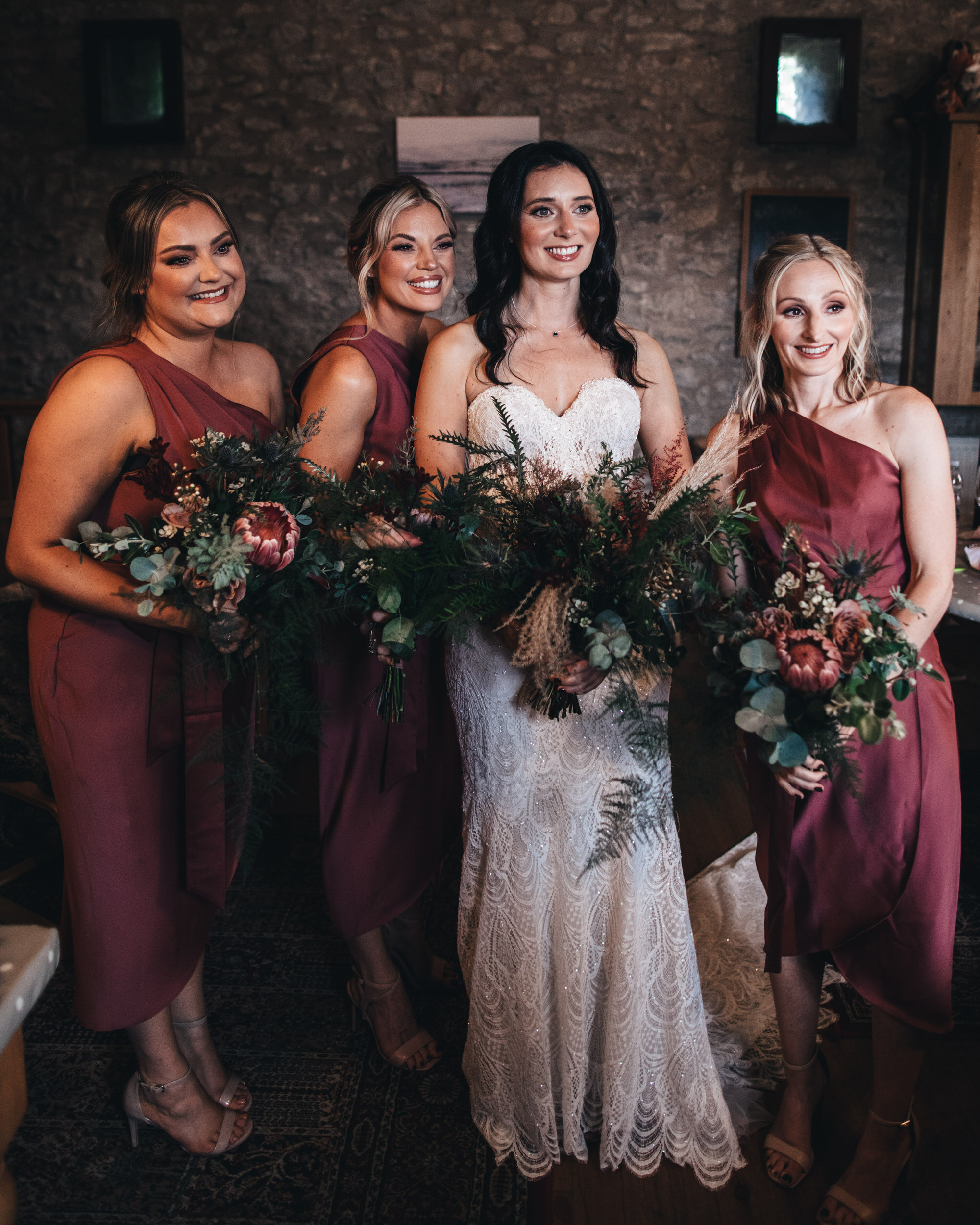 bride with maids before wedding