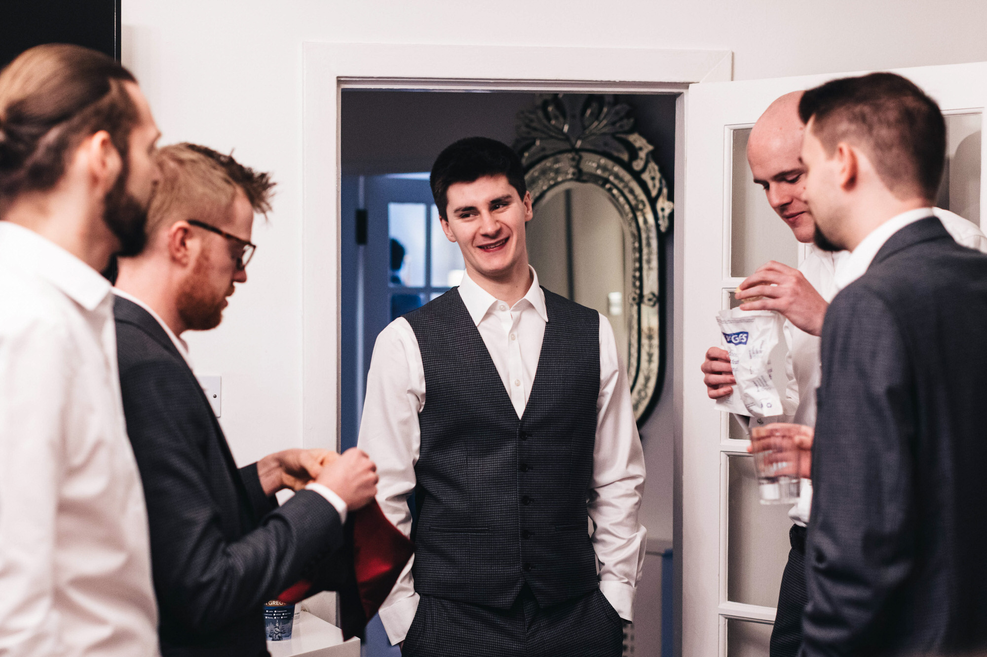 grooms gets ready with his friends