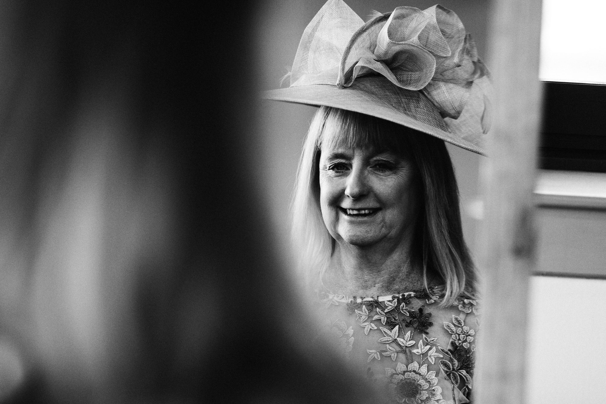 mother of the bride with hat on