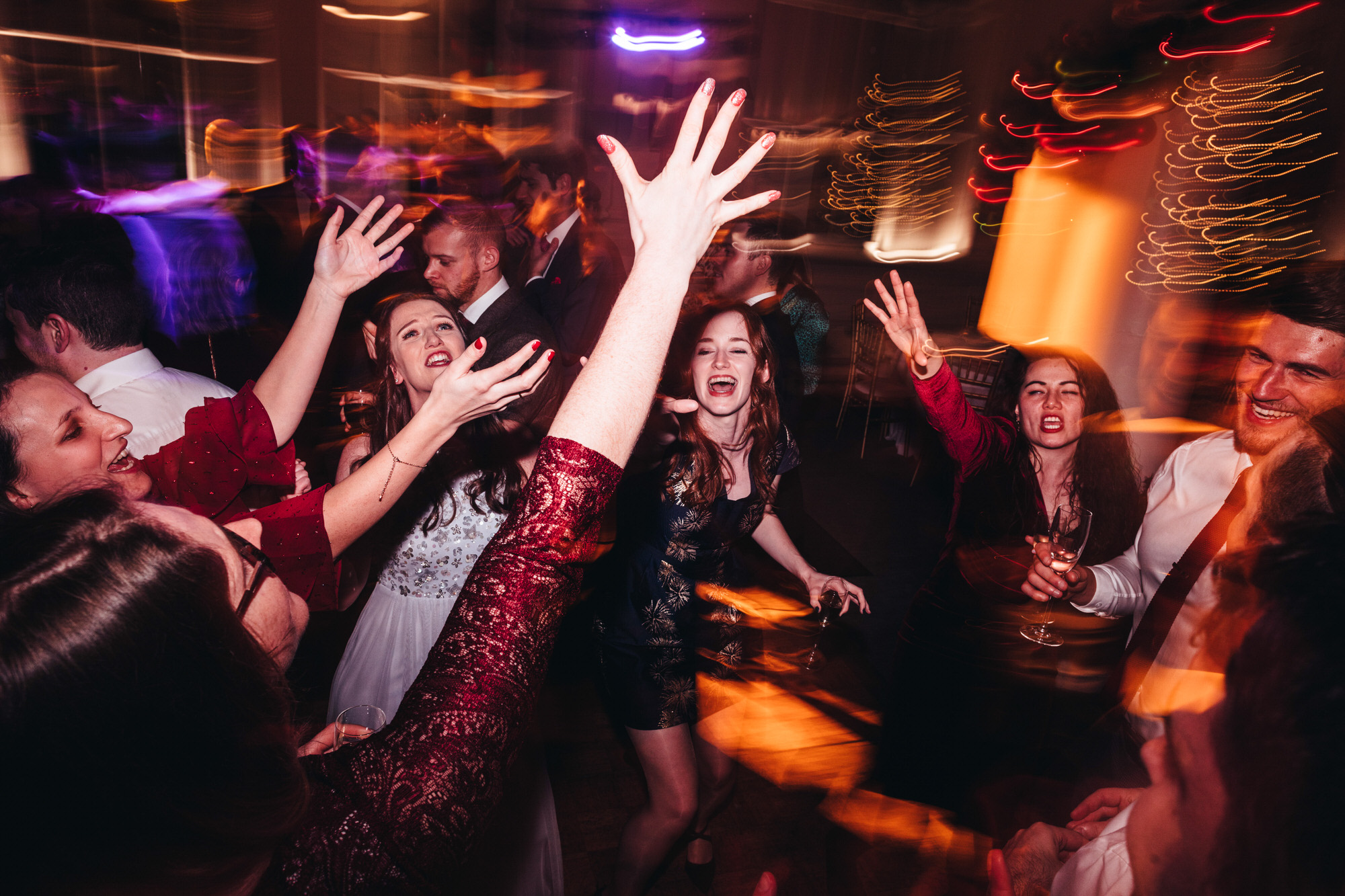 wedding guests dance in fun moments
