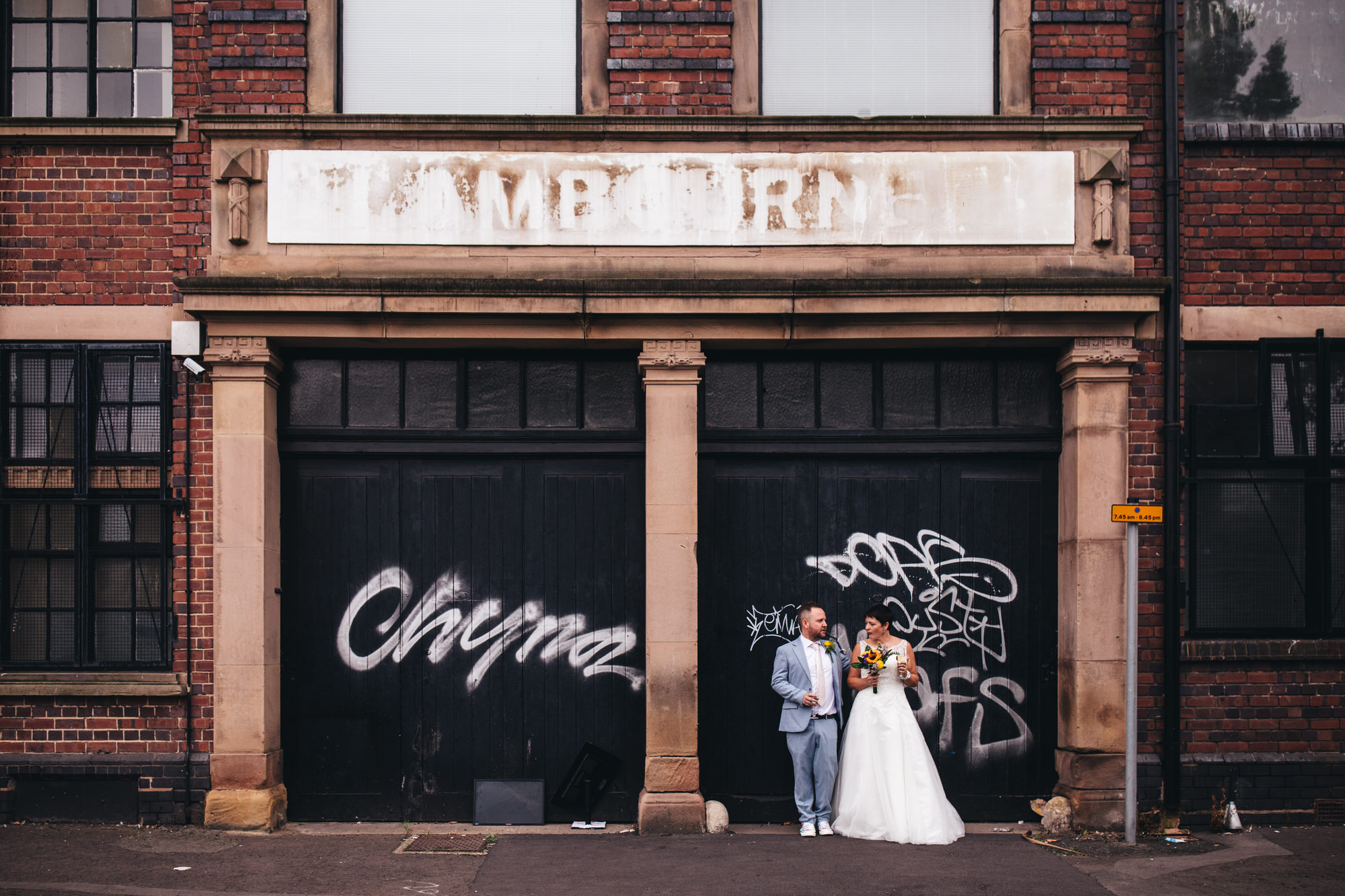 bride and groom wide urban shot in Birmingham