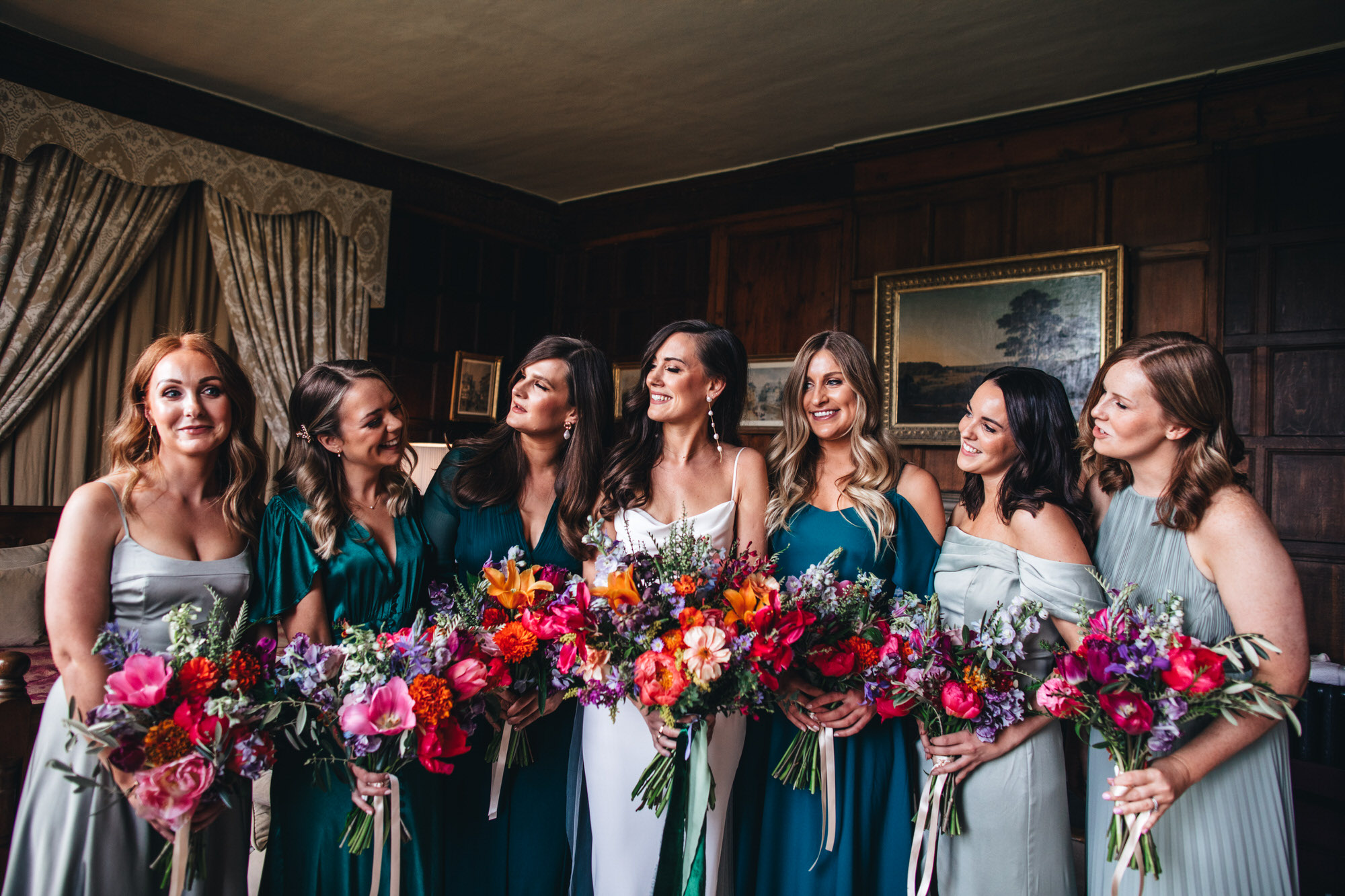 bride with bridesmaids and Wren and May flowers, wedding bouquets