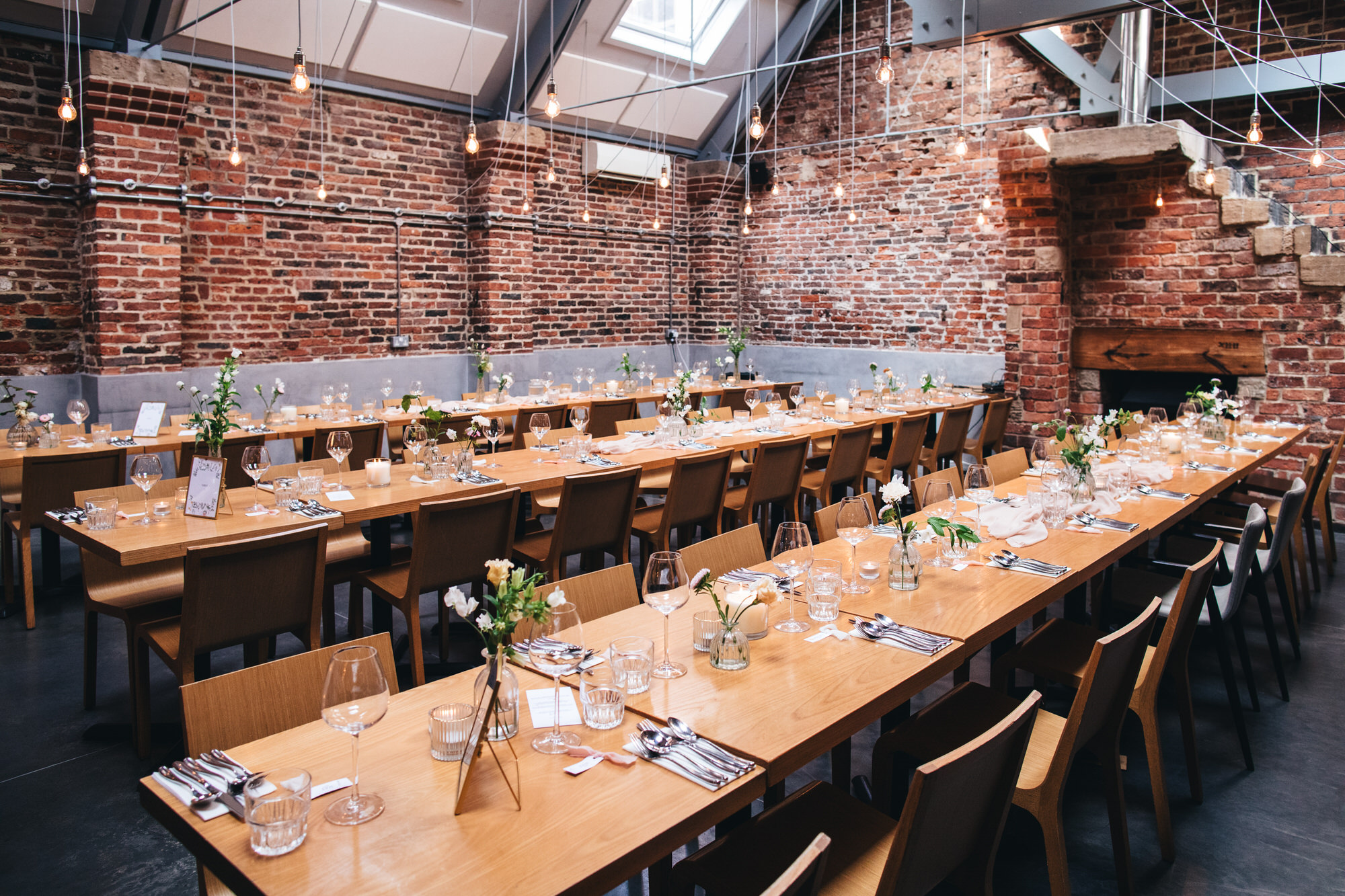 wedding tablewear, inside shears yard, long tables, flowers and name places