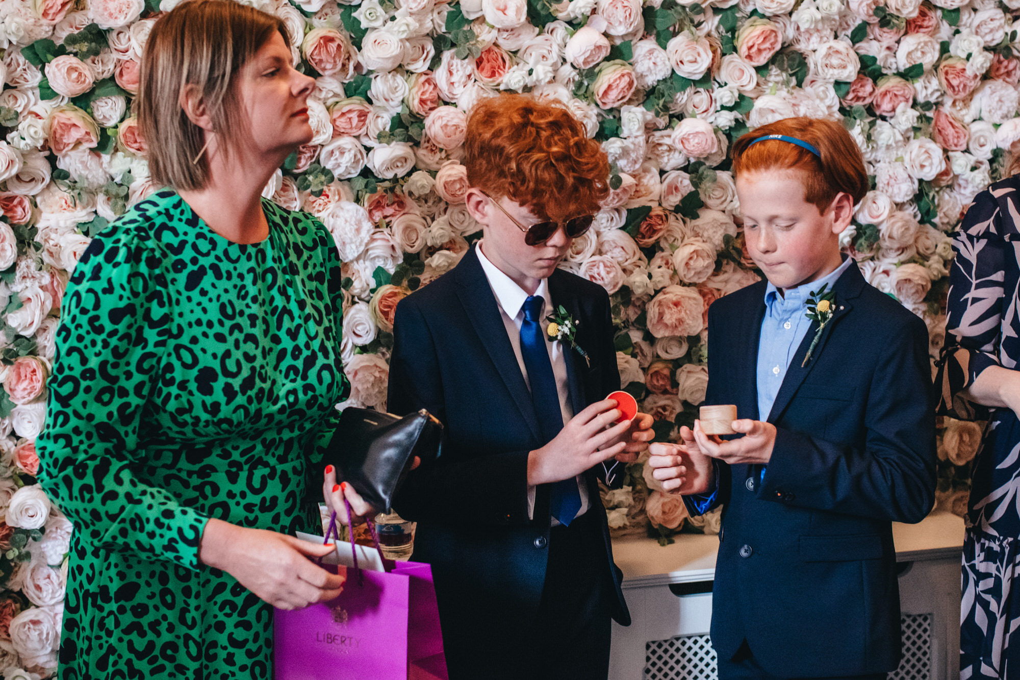 cool children wearing suits at Chelsea wedding