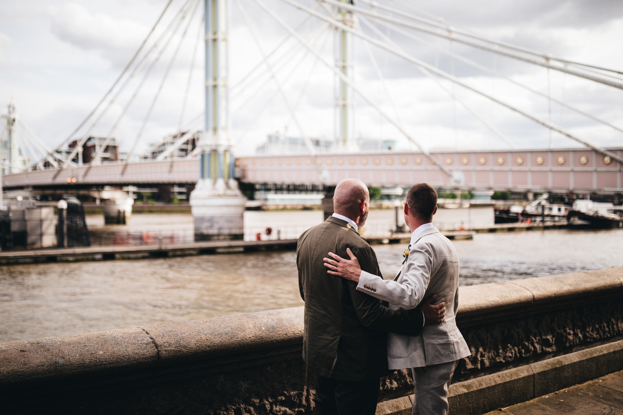 grooms together by Thames, LGBTQ+ wedding, Chelsea wedding, couple's shots