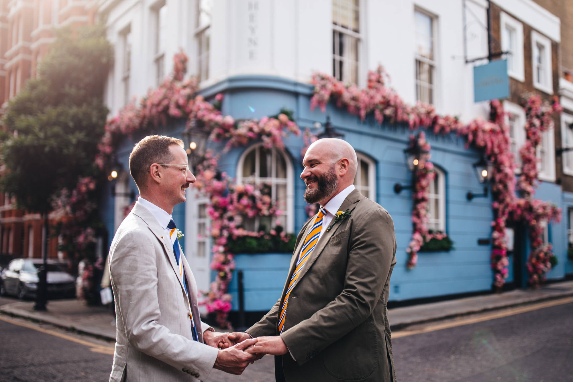 grooms holding hands, couple's shots, Chelsea wedding, LGBTQ+ wedding