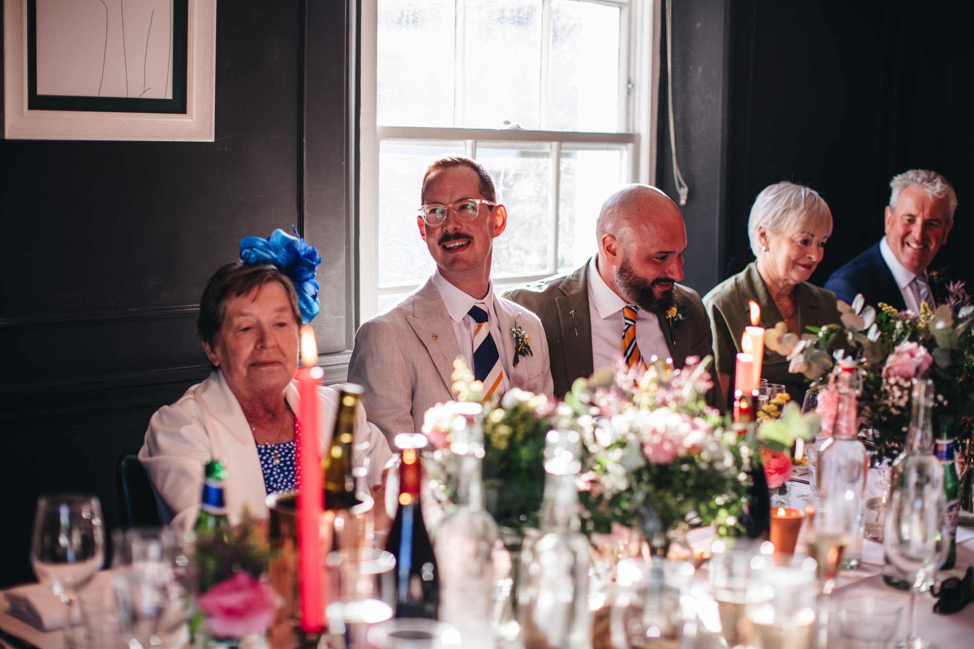 groom laughing at pub wedding breakfast speeches