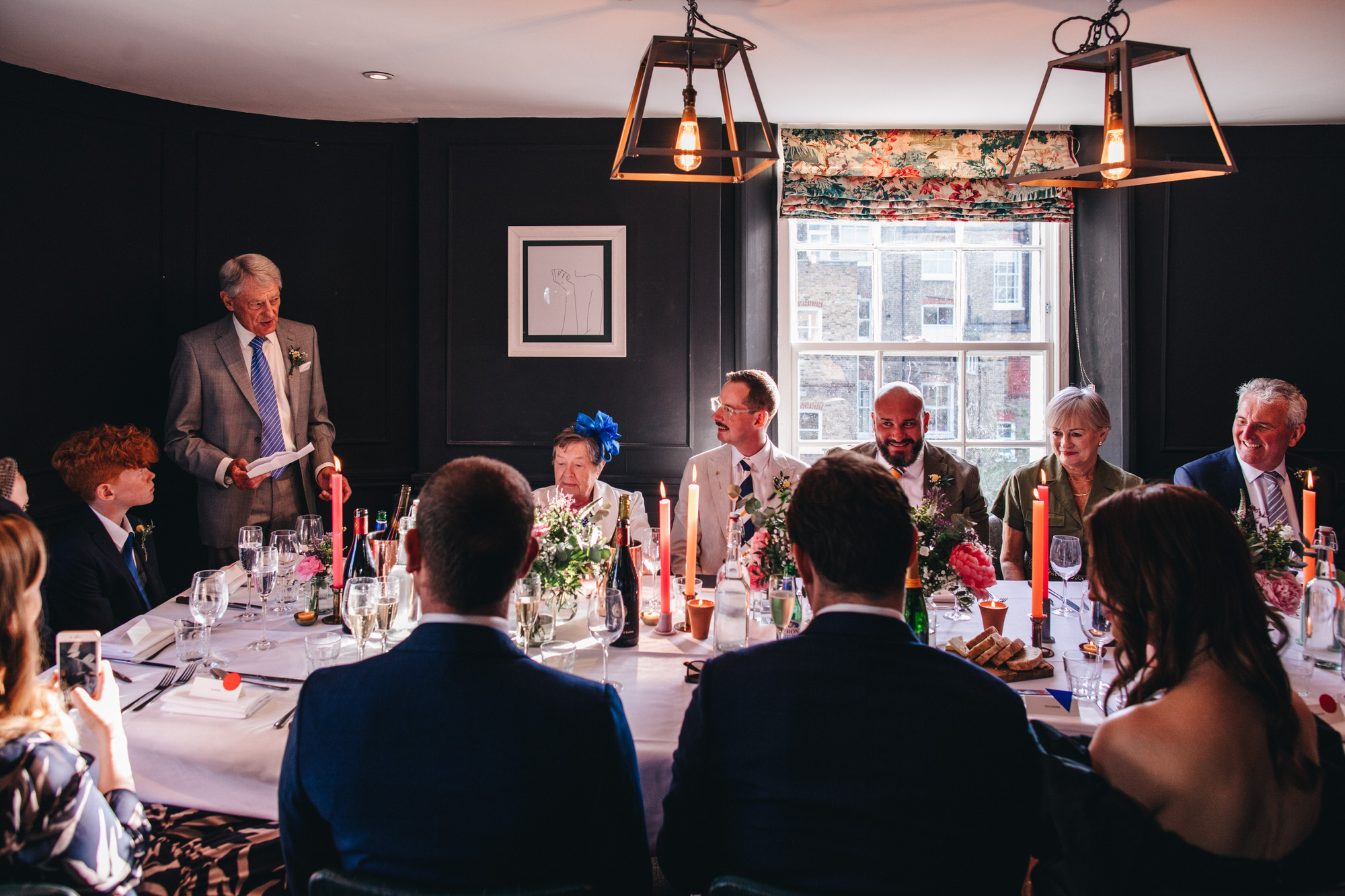 father of the groom makes speech at wedding breakfast inside London pub, London wedding at The Phene pub