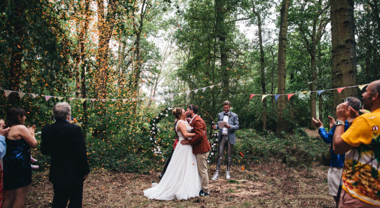 bride and groom kiss, festival wedding photography, documentary wedding photographer, woodland wedding photography, forest wedding ceremony